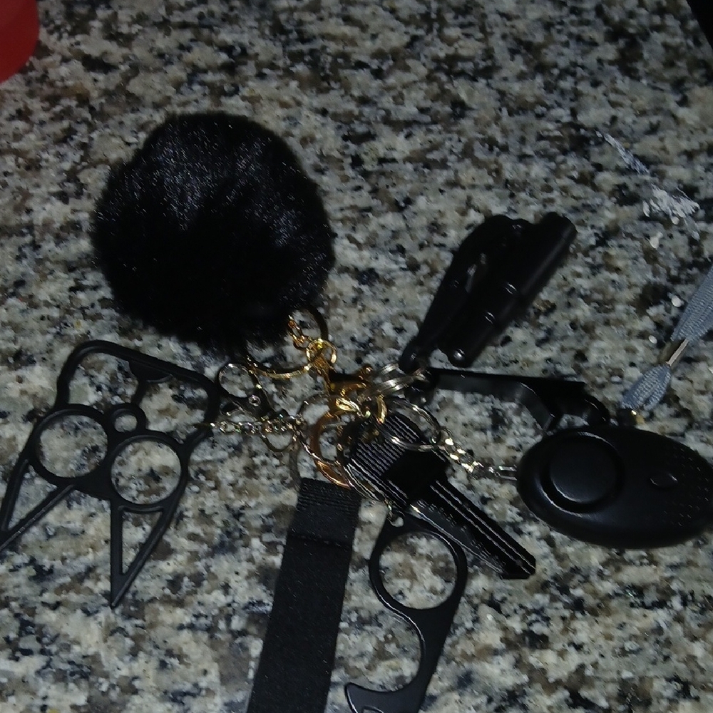 Black Keychain with Multi-Tool Accessories Great To Carry With You